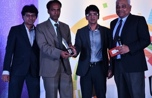 Tarun Kumar Pithode second from left receiving award during the Express Technology Sabha for implementing free WiFi in three remote village of Rajgarh district.