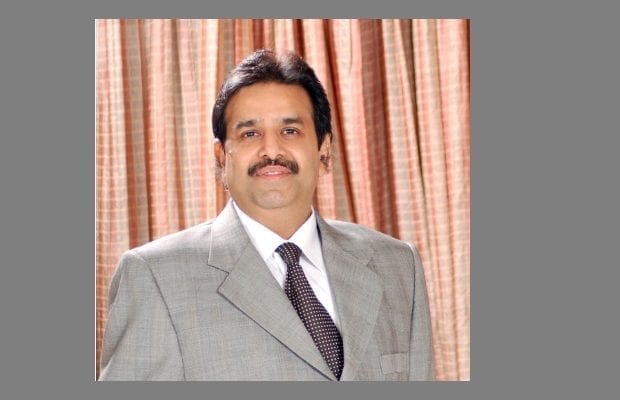 Ashok Kumar Gupta, Chairman, Optiemus Infracom